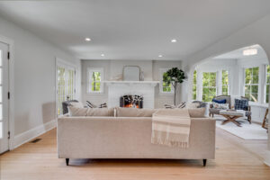 Bright open-concept living room with hardwood floors in a Minnesota home